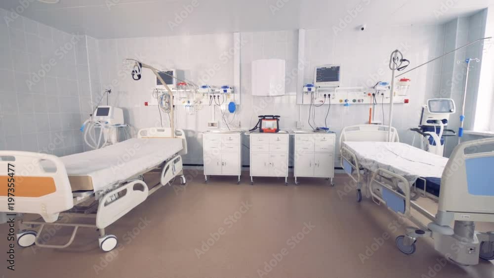 Fully-equipped spacious hospital ward with two empty beds Fully-equipped spacious hospital ward with two empty beds