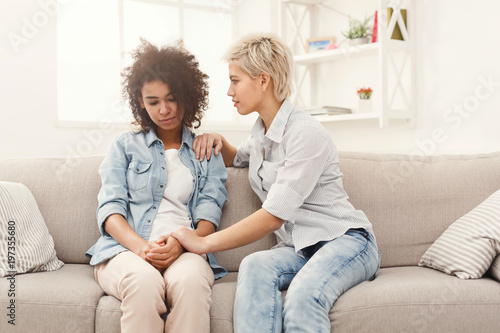 Two women talking about problems at home