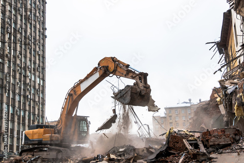 Hydraulic crusher excavator working on a demolition site