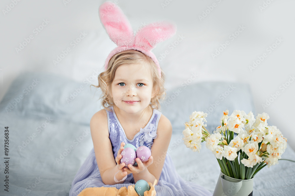 Cute funny girl with basket full of Easter eggs at home Cute funny girl with basket full of Easter eggs at home