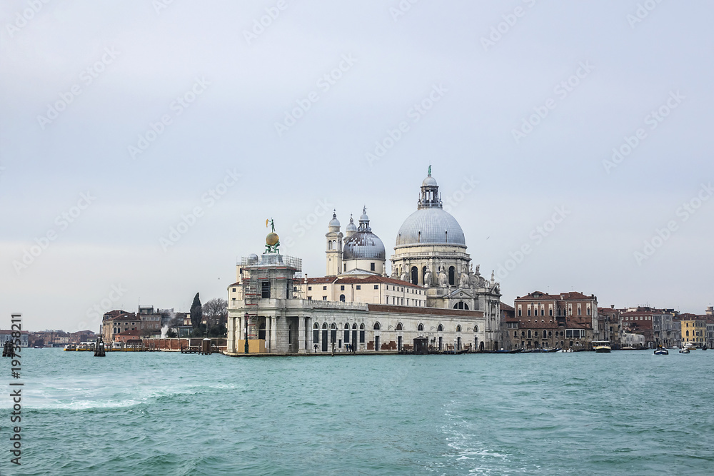 Seaview of Grand Canal and famous Basilica Santa Maria della Salute (1687). Venice, Italy.