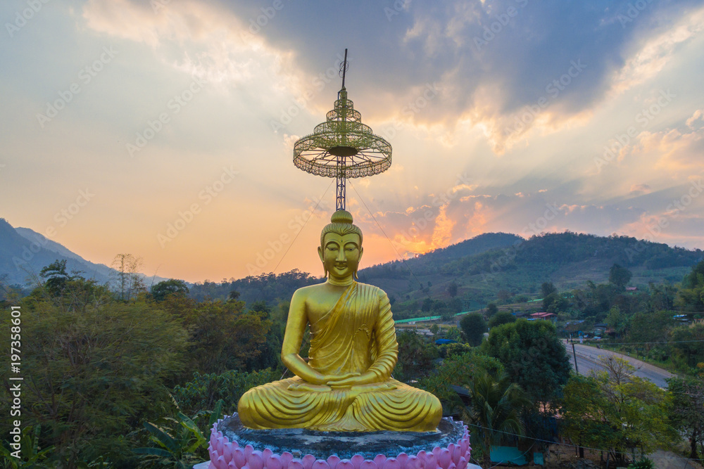 aerial photography the golden buddha statue at wat Sirattanan Mongkol near Mae Kajan Hot Spring. Wiang Pa Pao Chiang Rai Thailand.