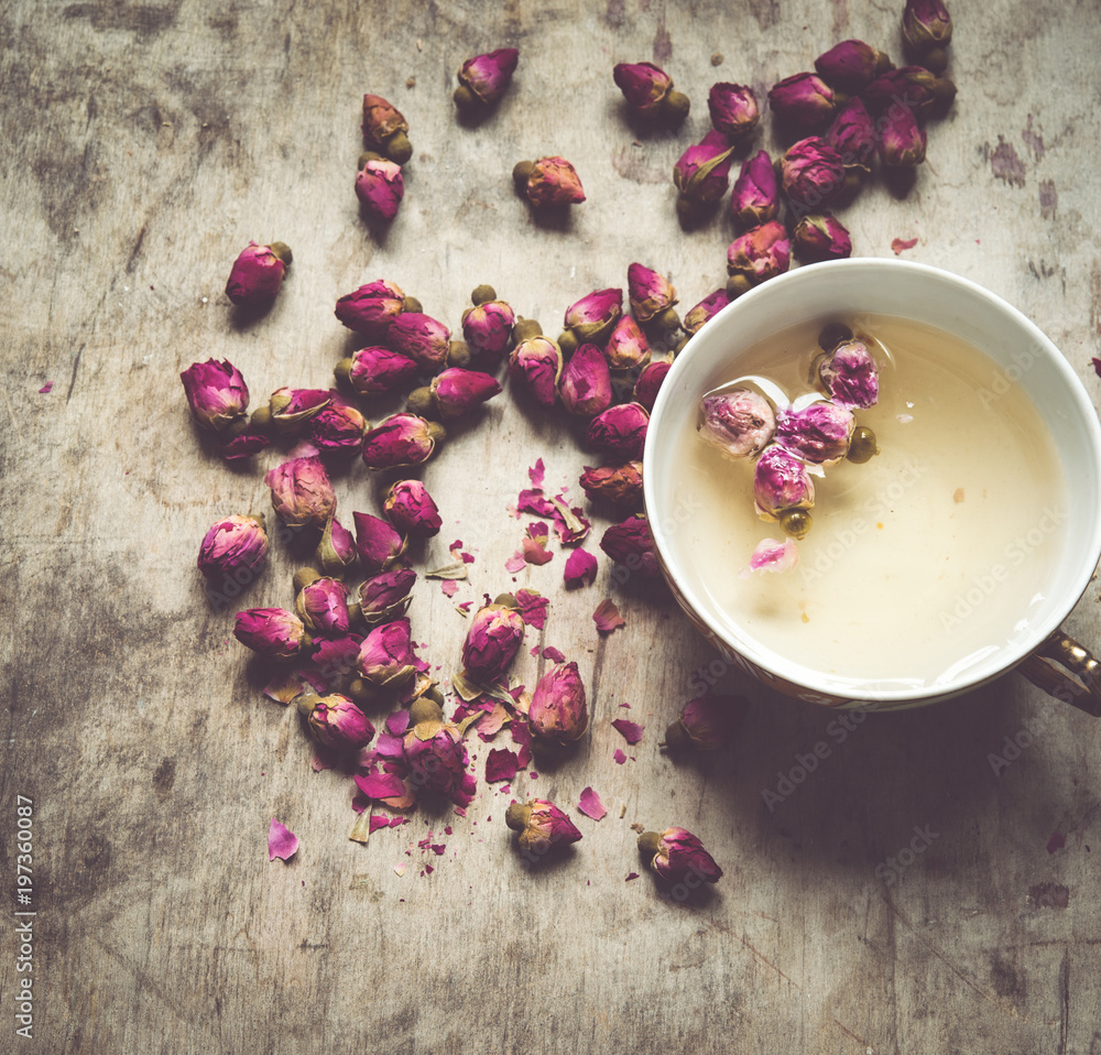 Tea with roses/toned photo