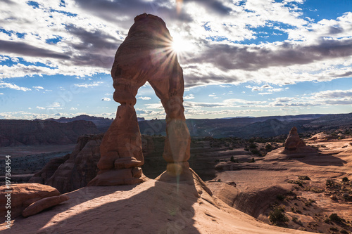 Sun Flare In Arches National Park Delicate Arch