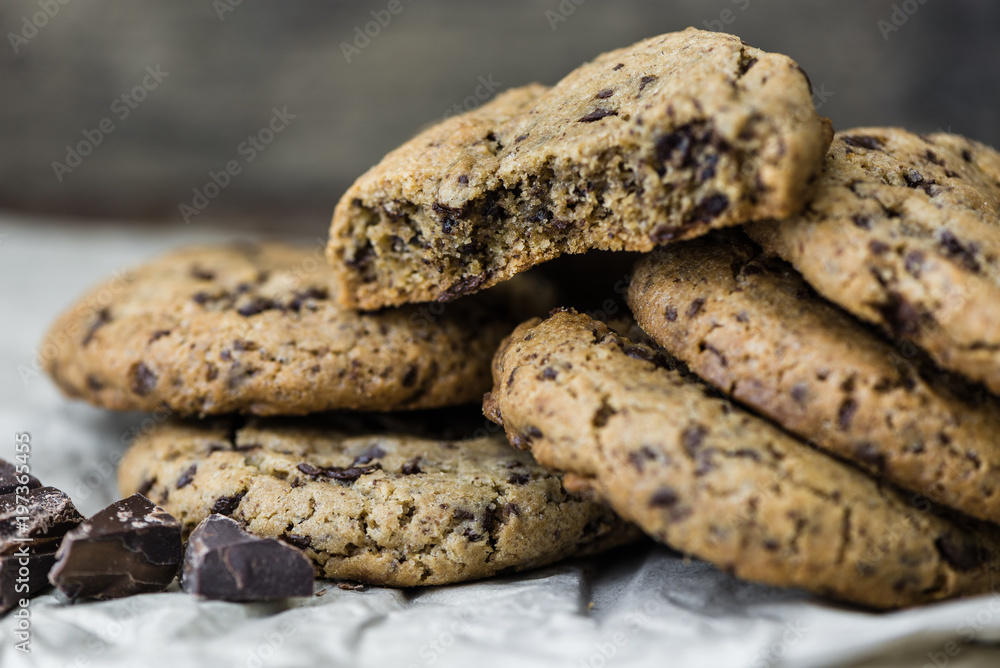 Freshly Baked Chocolate Cookies on Baking Paper. Sweet Biscuits. Homemade pastry. Freshly Baked Chocolate Cookies on Baking Paper. Sweet Biscuits. Homemade pastry.