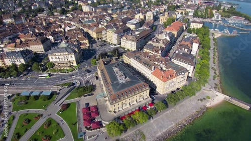 Aerial shot of Neuchatel - Switzerland Cities. Shot with a quadcopter on a bright sunny day. Beautiful architecture by the lake photo