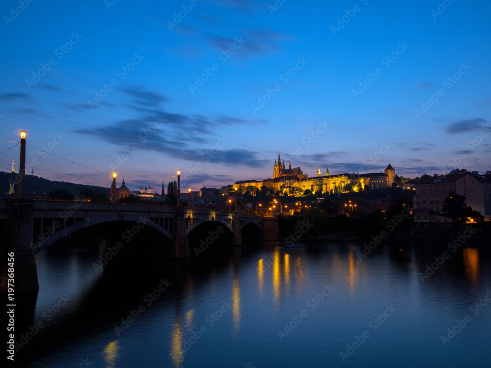 Amazing view of Prague town, Vltava river and Vitus Cathedral at late evening in Prague, Czech Republic
