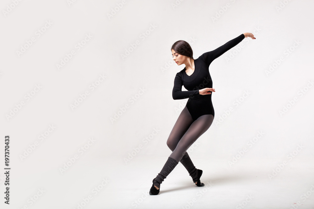 Obraz premium young beautiful dancer in black swimsuit