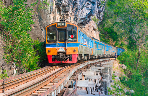 Thai Train on River Kwai Bridge of Kanchanaburi province, Thailand.