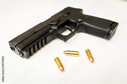 Bilde på lerret Handgun with ammo rounds and smoke