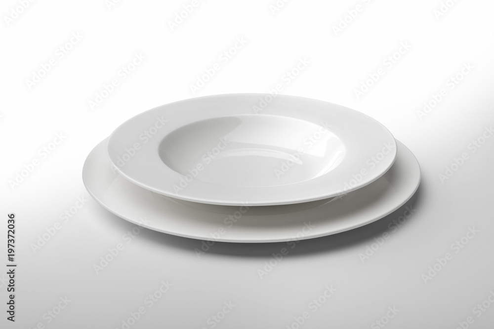 Empty round white plate and bowl Empty round white plate and bowl