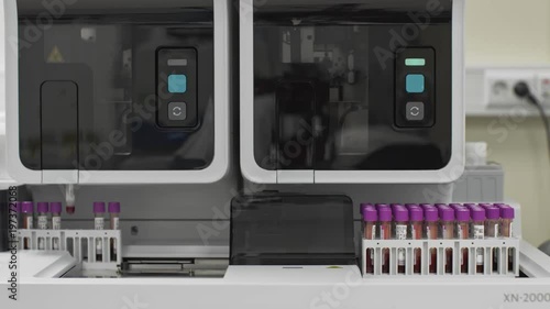 Medical automated blood test robotic machine. Clinical diagnostic laboratory equipment. Blood samples testing to find a treatment. Overall view