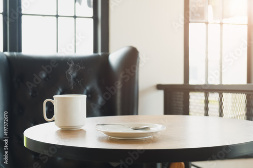Wallpaper Mural Coffee Cup on table Cafe shop put near window Interior Blur people background Torontodigital.ca