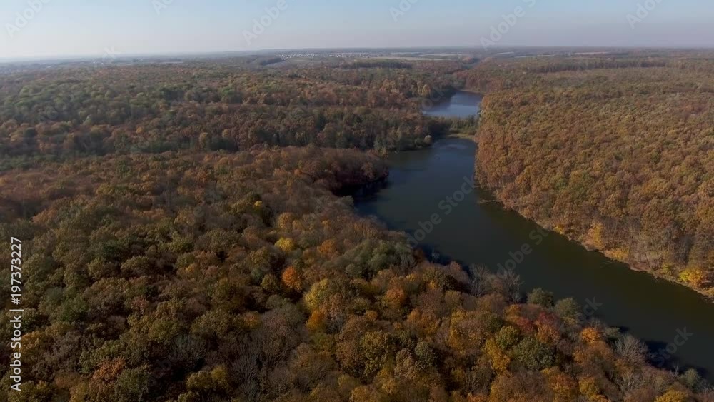 View from the top to the autumn forest and the river View from the top to the autumn forest and the river