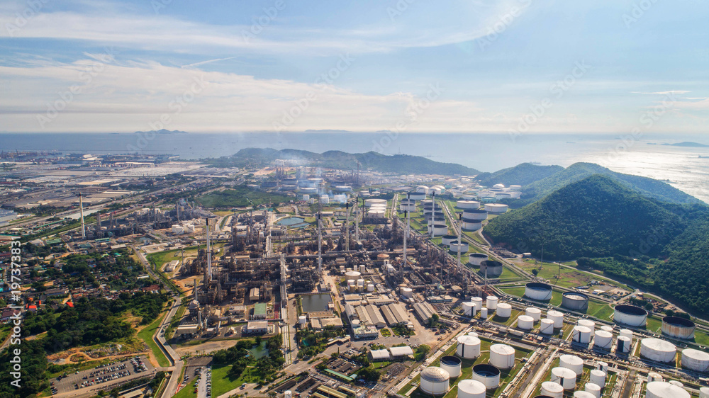 Aerial view Oil refinery with a background of mountains and sky. Aerial view Oil refinery with a background of mountains and sky.