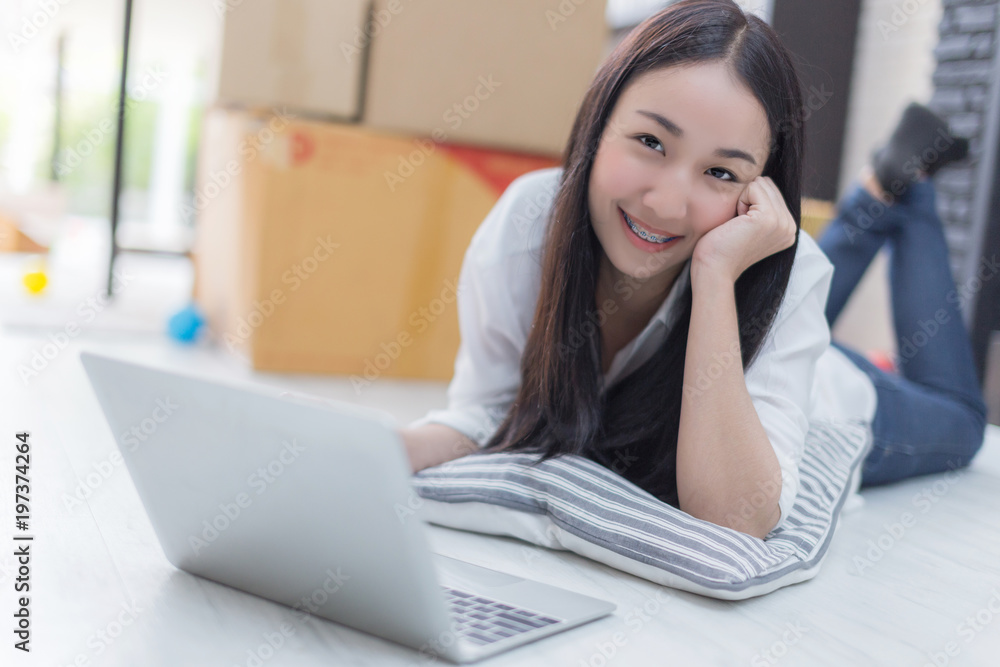 asian business marketing with laptop and box of product on table asian business marketing with laptop and box of product on table
