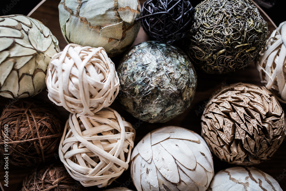 Fototapeta premium bowl of Various types of balls made from reuse materials decorating items