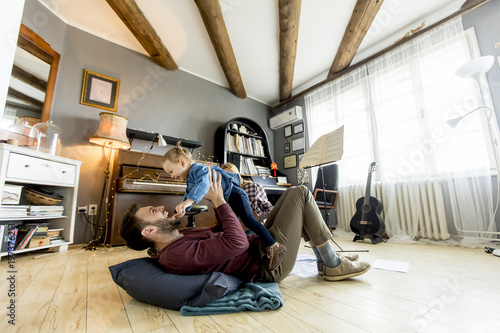 Young parents having fun wi...