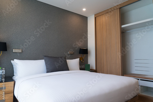 Принти на полотні Modern comfortable bed and built-in wardrobe