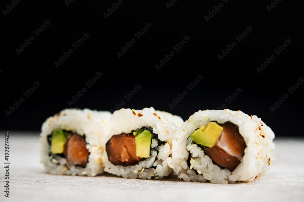 Japanese food Sushi Roll Maki of Salmon and avocado Japanese food Sushi Roll Maki of Salmon and avocado