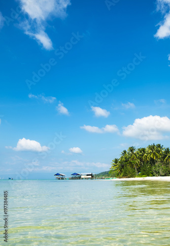 Beautiful tropical beach with white sand and clear blue water