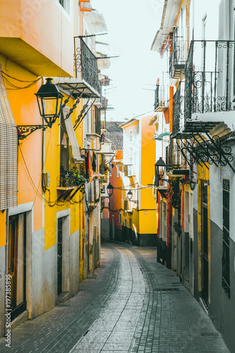 Colorful street in the historic center of Villajoyosa, Spain © vejaa