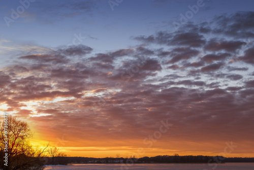 Spring sunset sky and ice