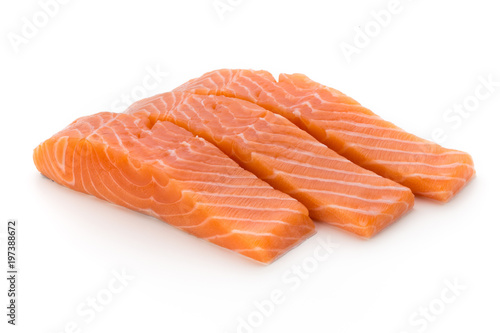 Fresh salmon fillet with basil on the white background.