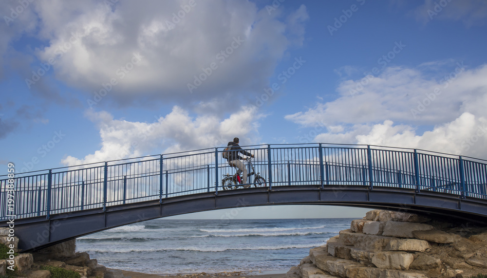 Bicycle Rider on a Bridge
