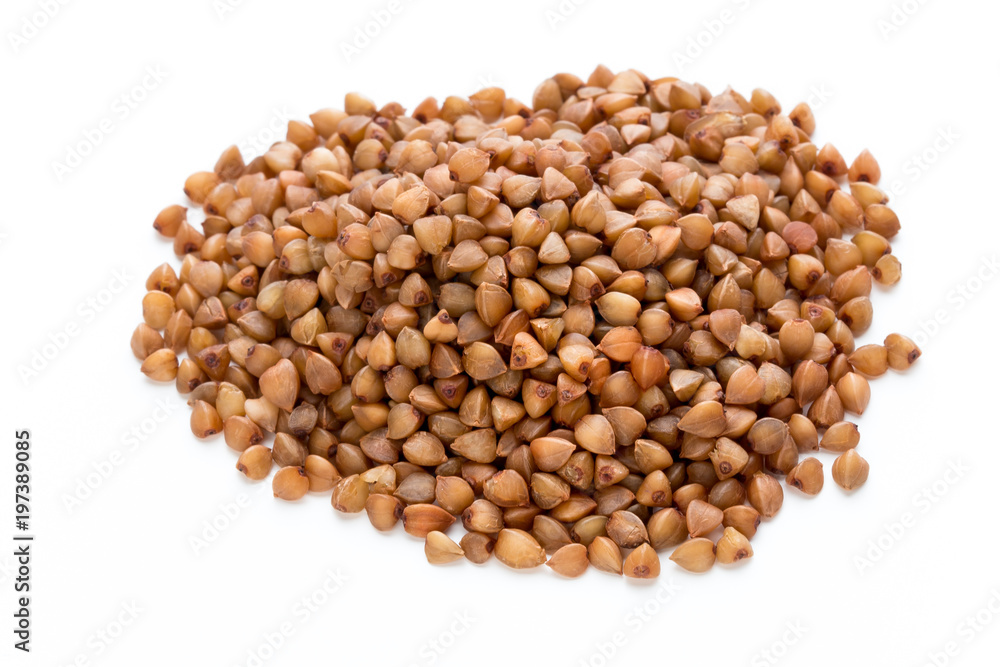 Buckwheat grains isolated on the white background. Buckwheat grains isolated on the white background.