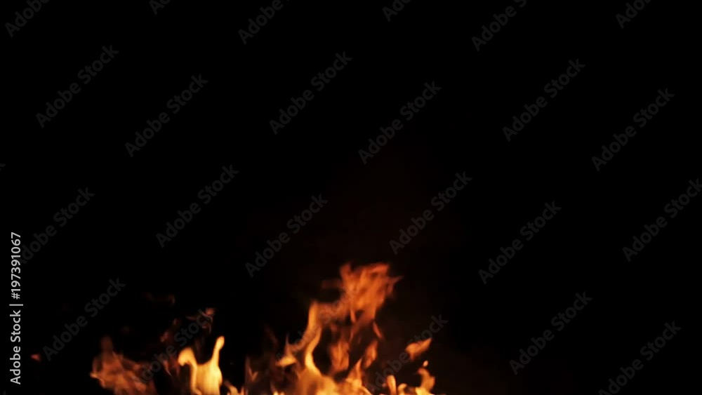 Real isolated fire with smoke on black background