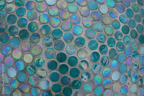 Colored mosaic on a concrete wall