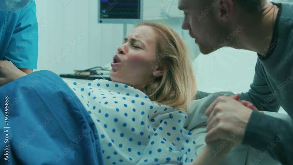In the Hospital Close-up on Woman in Labor Pushes to Give Birth