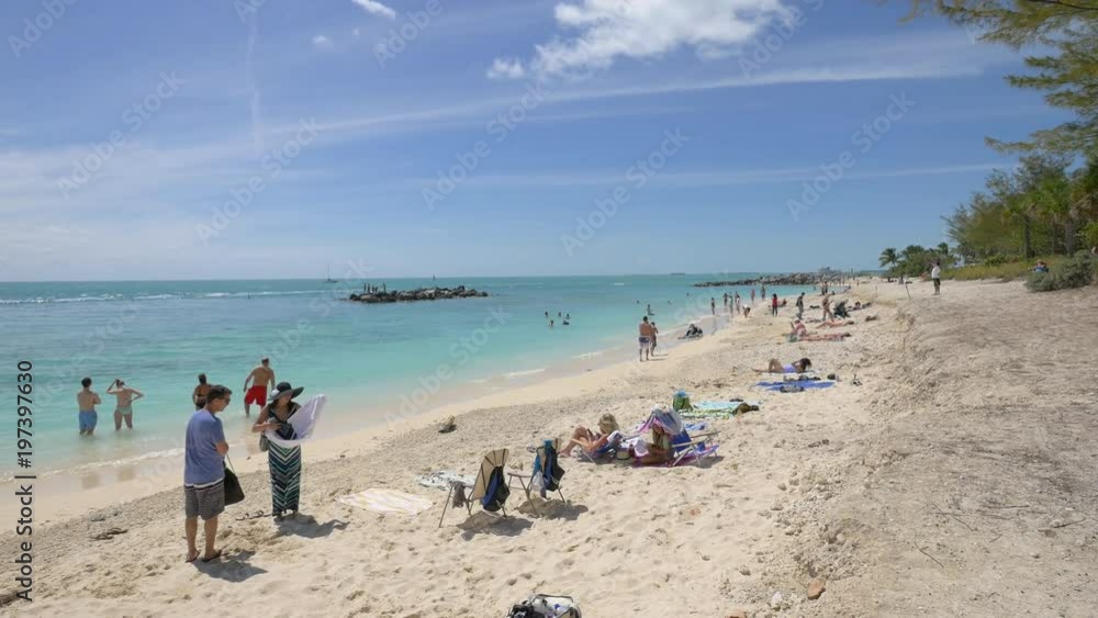 People tanning and relaxing on the beach People tanning and relaxing on the beach