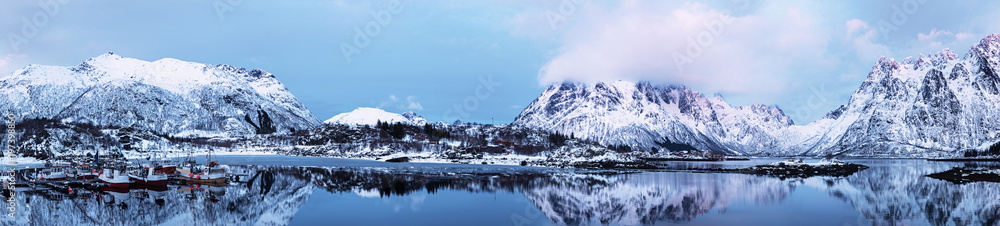 Landscape with beautiful winter lake and snowy mountains at Lofoten Islands in Northern Norway. Panoramic view