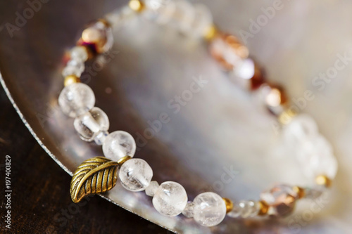 Wallpaper Mural Beautiful yoga bracelet on natural background Torontodigital.ca