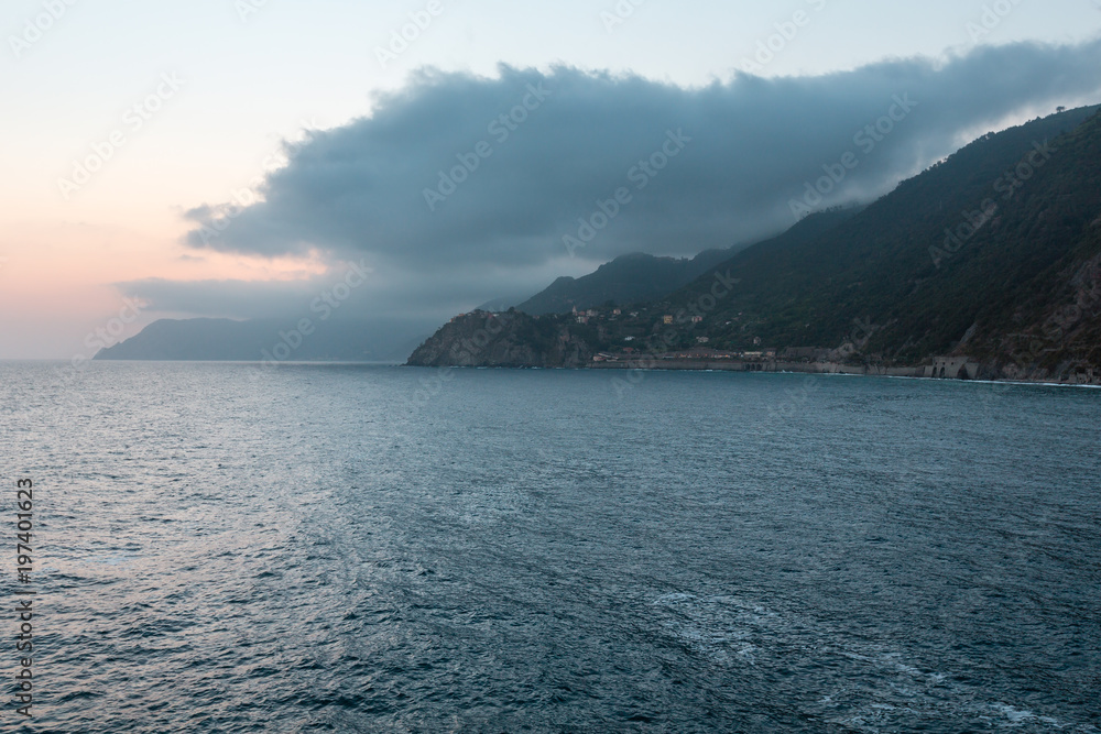 Summer evening Corniglia view from Manarola, Cinque Terre, Italy Summer evening Corniglia view from Manarola, Cinque Terre, Italy