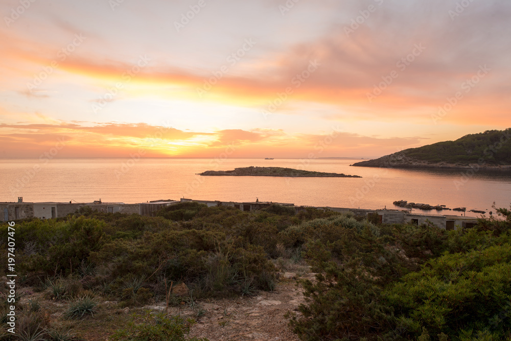 Cala de Sal rossa at sunrise in Ibiza