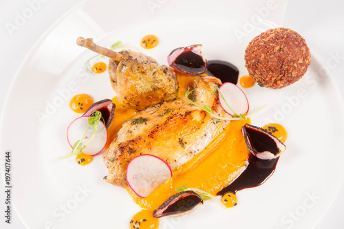 Guinea fowl, pumpkin puree, fried buckwheat, gravie sauce photo