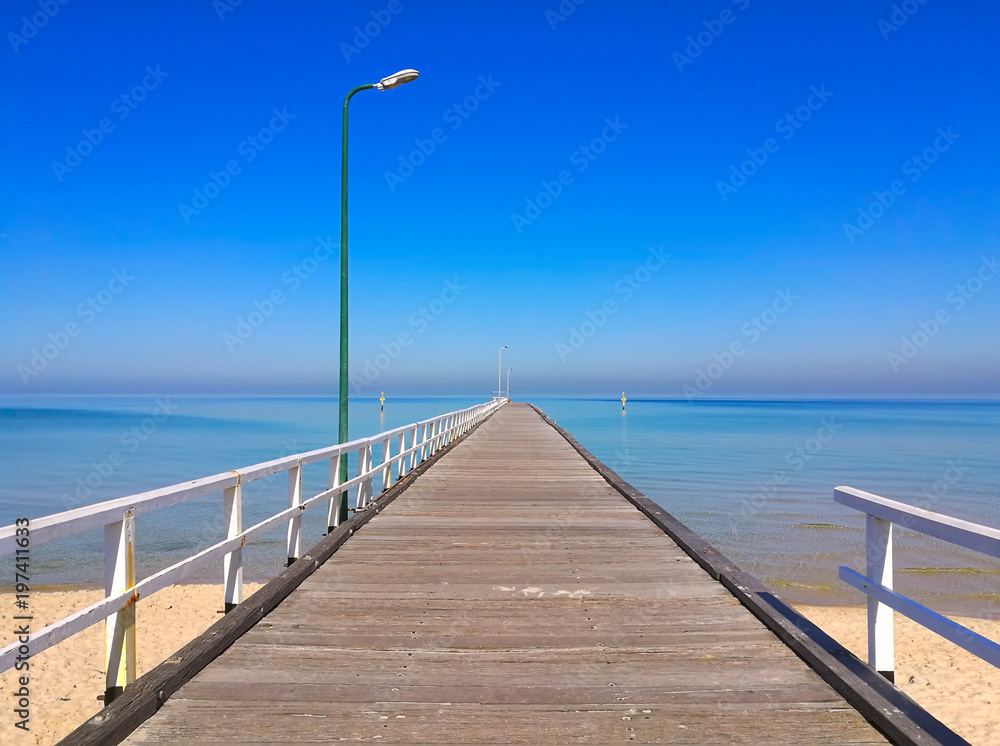 Pier to the sea in summer