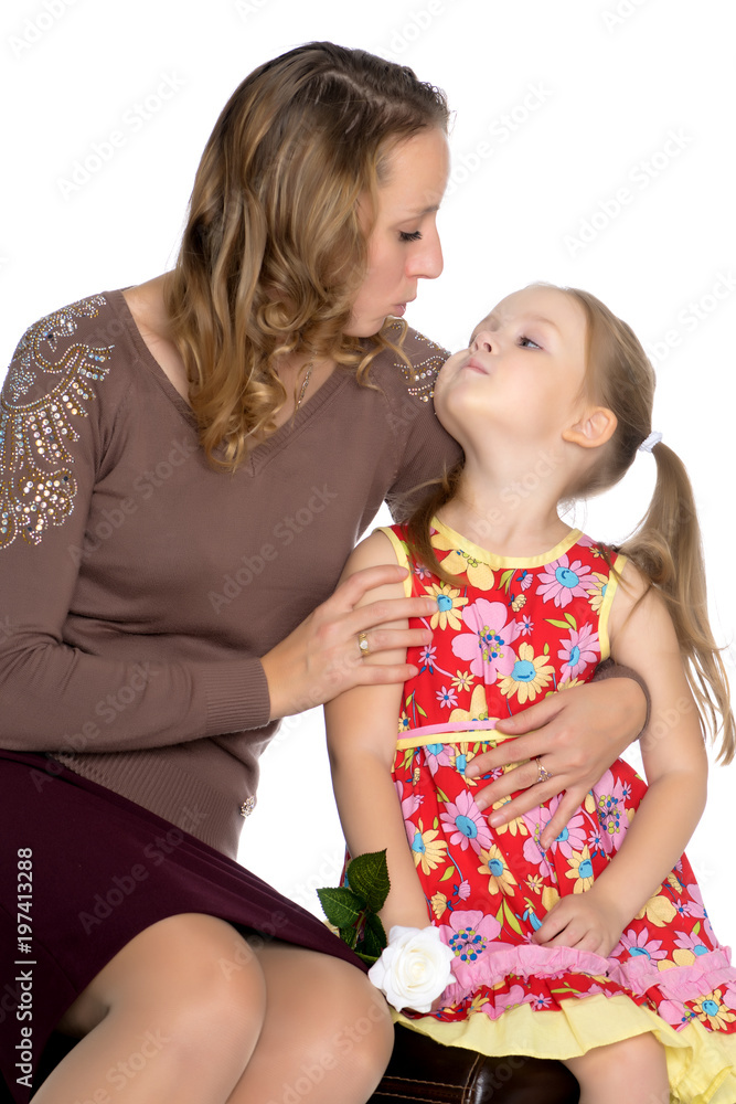 mother and little daughter gently embrace mother and little daughter gently embrace