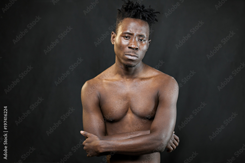 emotions black young man on a black background