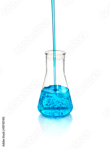 blue liquid that pours into the flask photo