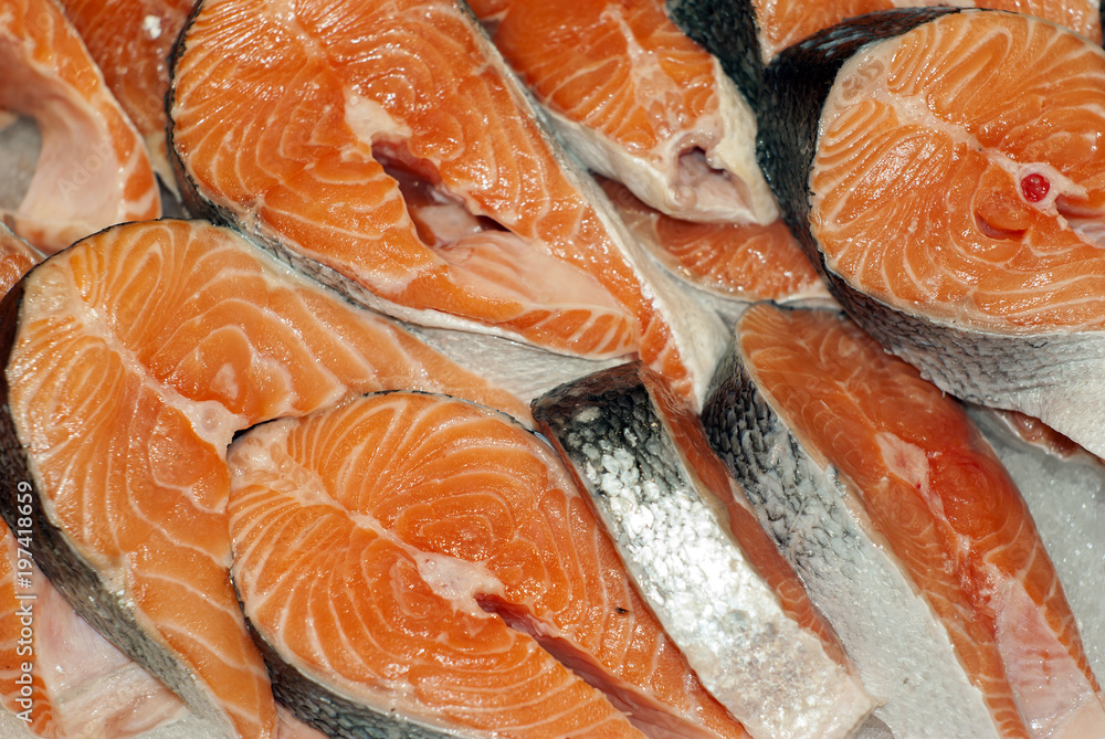 background - raw salmon steaks closeup background - raw salmon steaks closeup