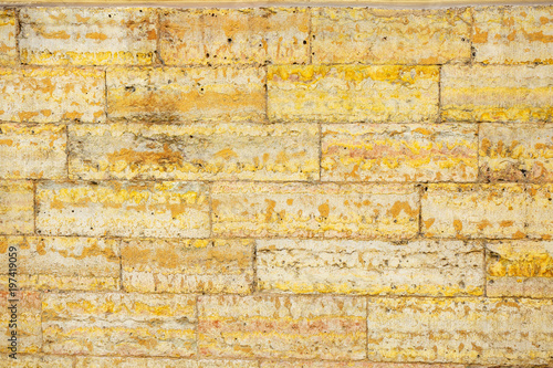 Gray and yellow cinder block wall background, cinder block Foundation