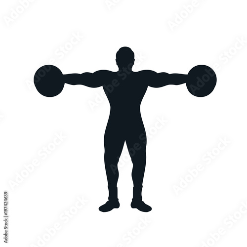 Silhouette of a man lifting dumbbell with powerful muscle at gym workout