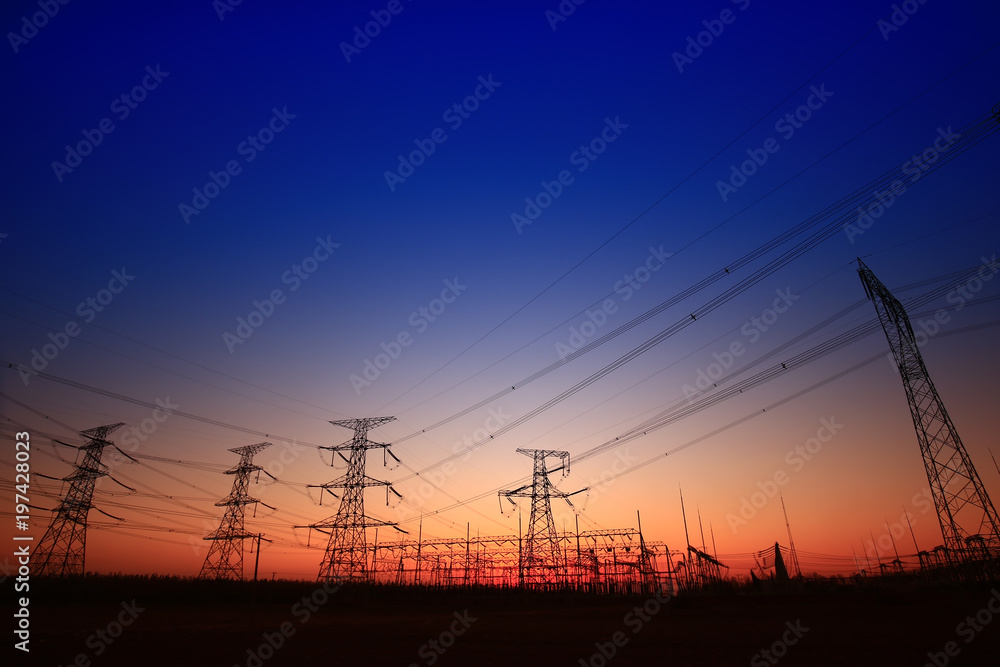 Sunset silhouette of pylon