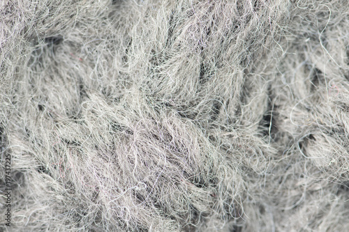 Gray wool knitted background.