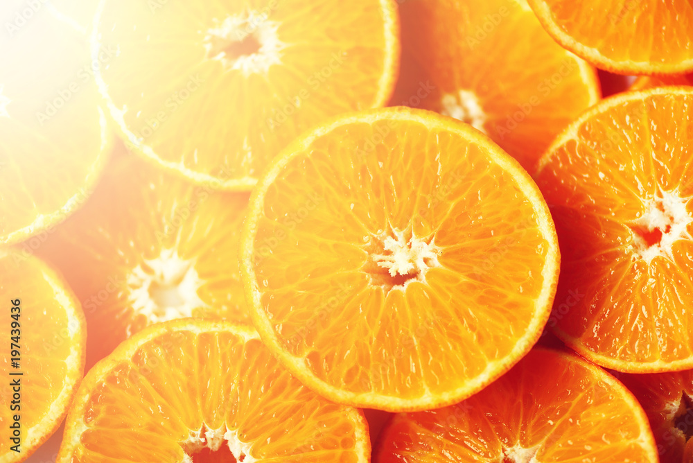Fresh sliced orange fruit texture. Macro, top view, copy space. Food frame. Juicy oranges background Fresh sliced orange fruit texture. Macro, top view, copy space. Food frame. Juicy oranges background