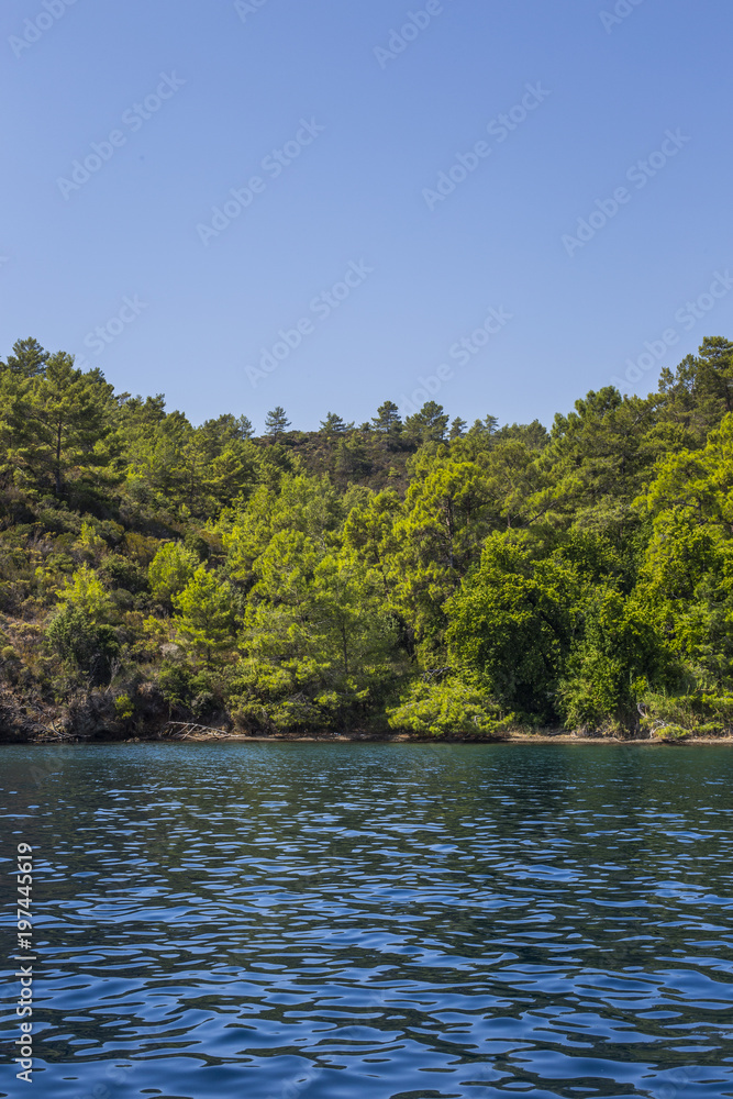 Scenic view of sea bay and mountain islands Scenic view of sea bay and mountain islands